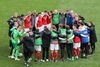 TOPSHOT - Denmark's and Finland's players huddle as the UEFA EURO 2020 Group B football match between Denmark and Finland was to resume after being suspended at the Parken Stadium in Copenhagen on June 12, 2021. (Photo by WOLFGANG RATTAY / various sources / AFP)