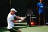 Mikael Torpegaard med sin lånte ketsjer. På strengene kan ses hans forsøg på at overmale Head-logoet med et Wilson-logo. Foto: AtlanticTireChampionships