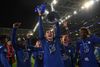 Soccer Football - Champions League Final - Manchester City v Chelsea - Estadio do Dragao, Porto, Portugal - May 29, 2021 Chelsea's N'Golo Kante, Tammy Abraham, Andreas Christensen and Ben Chilwell celebrate with the trophy after winning the Champions League Pool via REUTERS/David Ramos