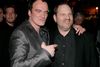 Så gode venner var de. Quentin Tarantino (tv) og Harvey Weinstein fester i 2007 efter premieren på et af deres mange fællesprojekter "Grindhouse". Foto: Matt Sayles/AP