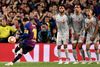 Barcelona's Argentinian forward Lionel Messi scores a free kick during the UEFA Champions League semi-final first leg football match between FC Barcelona and Liverpool at the Camp Nou stadium in Barcelona on May 1, 2019. (Photo by JOSE JORDAN / AFP)