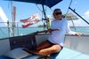Signe Storr ved roret i Bahamas på sin og sin kæreste Henrik Hansens 30 fods Allegro fra 1988. Foto: Storr