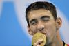 Phelps var sidste mand i bassinet fra amerikanerne, og han overtog stafetten med knap to sekunders forspring ned til Japan på andenpladsen. Foto: Michael Sohn/AP