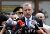 Hverken smil eller løfter var i overflod, da Tyrkiets præsident Recep Tayyip Erdogan med et ansigt lagt i stive folder mandag holdt møder med EU’s øverste top for at diskutere flygtningekrisen.