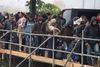 Tyskland har modtaget over en million flygtninge og immigranter siden 2015, og alene sidste år kostede området staten 20 mia. euro. Foto: Sebastian Kahnert/dpa via AP
