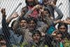 Asylsøgere på den græske ø Lesbos protesterer med EU-aftalen med Tyrkiet.