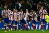 Atleticos Fernando Torres scorede begge mål i kampen mod ærkerivalerne fra kongeklubben i Madrid.