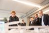 AGF-formand Lars Fournais (th.) forventer en beslutning om et nyt stadion i løbet af efteråret. Her ses han ved arkitekt Søren Leths præsentation af Aarhus Folkepark-projektet i februar. Ved siden af formanden er det AGF-direktør Jakob Nielsen. Arkivfoto: Stine Rasmussen