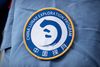 A patch for the China Lunar Exploration Program is displayed on the uniform of a worker at the Wenchang Space Launch Site in Wenchang in southern China's Hainan province, Monday, Nov. 23, 2020. Chinese technicians were making final preparations Monday for a mission to bring back material from the moon's surface for the first time in nearly half a century ó an undertaking that could boost human understanding of the moon and of the solar system more generally. (AP Photo/Mark Schiefelbein)