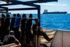 27 migranter, der siden starten af august har været strandet på tankskibet "Maersk Etienne", er ifølge Danske Rederier og Maersk Tankers blevet overflyttet til ngo-skibet "Marie Jonio". Foto: Thomas Lohnes / AFP