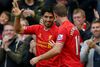 Liverpools Luis Suarez fejrer sit tredje mål mod West Bromwich.