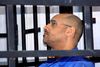Saif al-Islam Gaddafi under retssag i 2014. Arkivfoto: REUTERS/Stringer