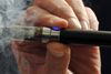 Fra den 7. juni i år har et flertal i Folketinget sidestillet e-cigaretten med almindelig cigaretter i forhold til køb og salg. Foto: Torin Halsey/AP