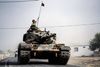 Tyrkiet sendte onsdag kampvogne over grænsen til Syrien for at erobre byen Jarablus fra Islamisk Stat. Foto: Halit Onur Sandal/AP