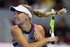 Caroline Wozniacki tog mandag hul på hendes deltagelse ved WTA-sæsonfinalen, hvor hun med lethed besejrede Elina Svitolina i to sæt. Foto: Andy Wong/AP