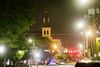 Politiet spærrede området omkring kirken i Charleston af, kort efter at drabene havde fundet sted. Foto: David Goldman/AP