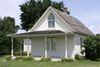 Det berømte hus i Eldon i Iowa, som kunstneren i 1930 brugte som baggrund for sit berømte maleri. Huset var indtil for et par år siden udlejet til skiftende lejere, men indgår i dag som en del af museet på stedet. Foto: AP