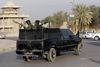 Blackwater patruljerer i Bagdad. Der forelå en aftale mellem Danmark og Blackwater om assistance, hvis danske konvojer kom i problemer. Foto: AP Photo/Khalid Mohammed