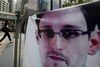 Edward Snowden har forladt Hong Kong efter et par ugers ophold, men støttebannerne for den amerikanske it-ekspert hænger der stadig mandag.